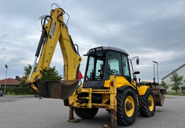 2011 Rovokopač-utovarivač New Holland B115B