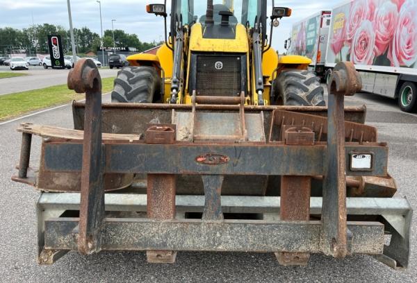 2011 Rovokopač-utovarivač New Holland B115B